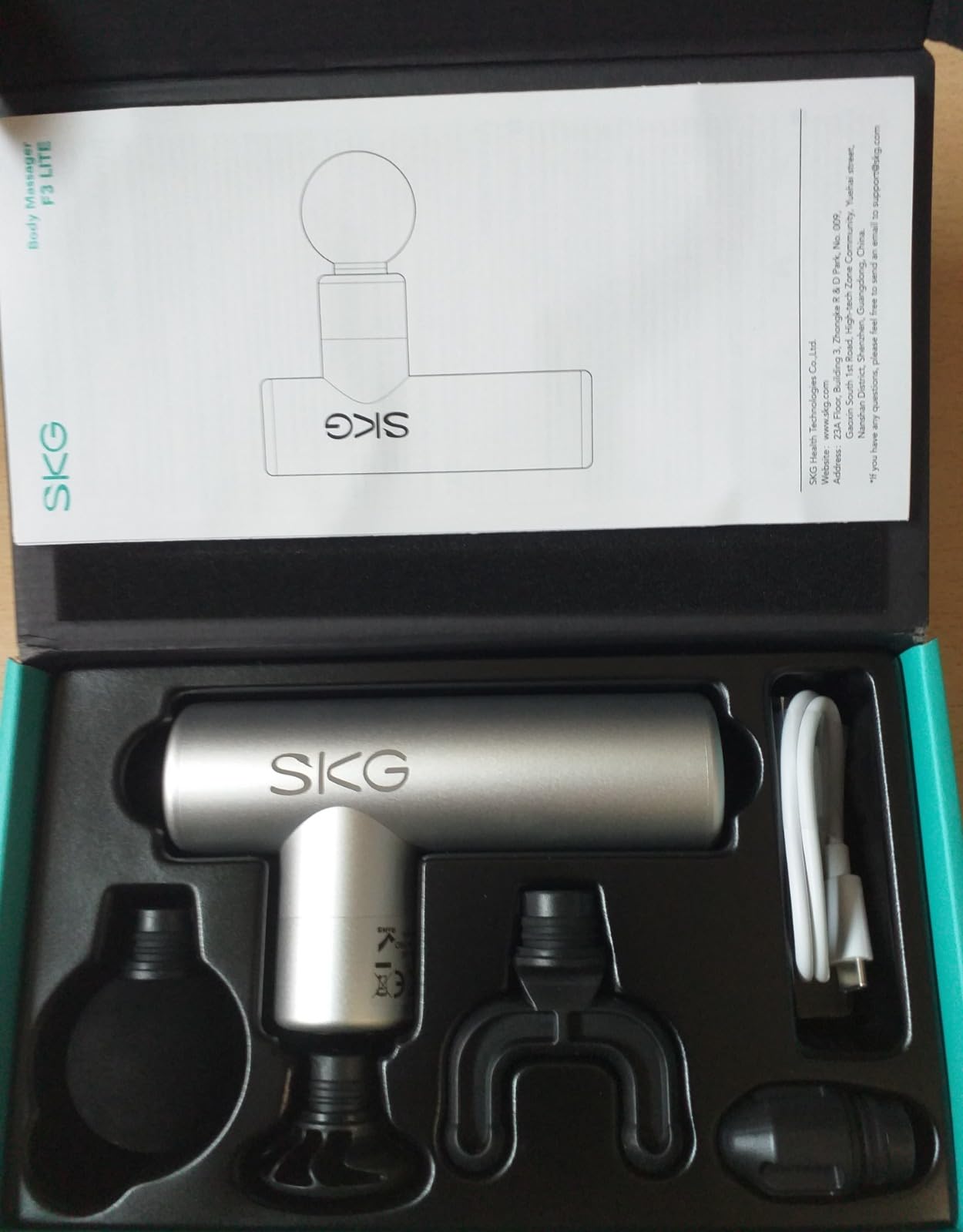 SKG F3 Lite pistola massaggiante argento 4 testine 3200 giri